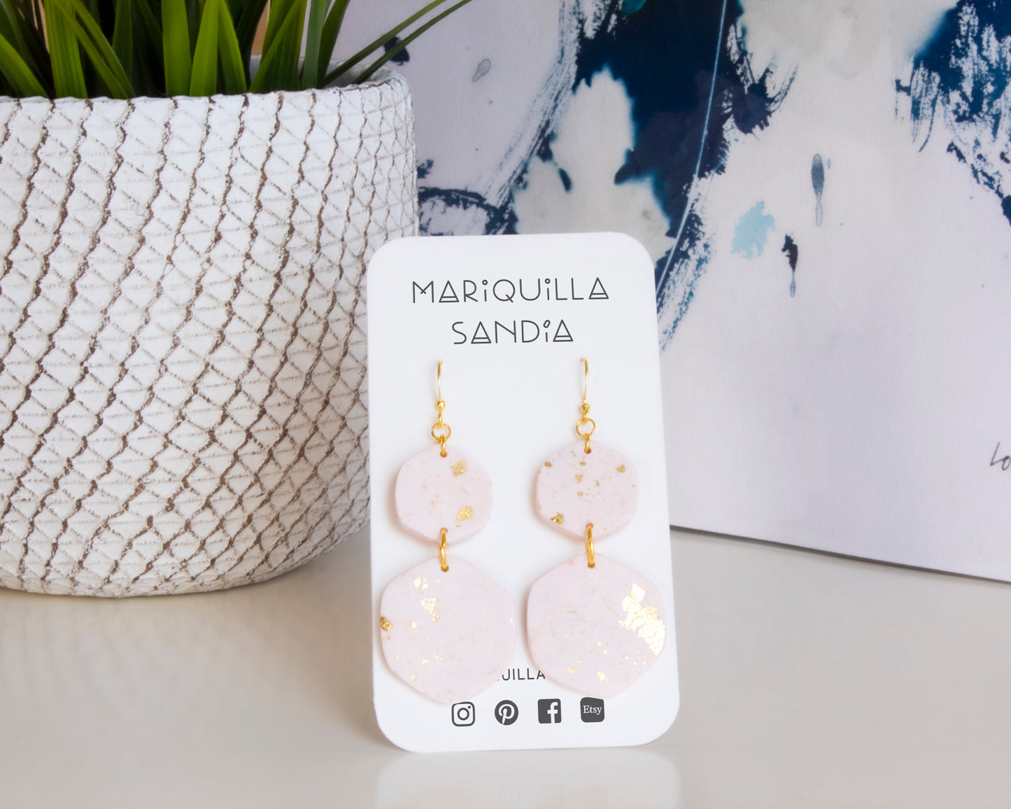 Beautifully packaged white and gold leaf boho earrings displayed on a Mariquilla Sandía card, ready for gifting