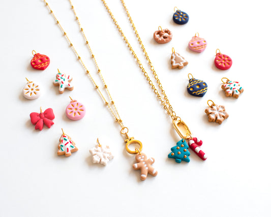 Personalized Christmas charm necklace with gold carabiner holder and handmade clay charms gingerbread candy cane snowflake