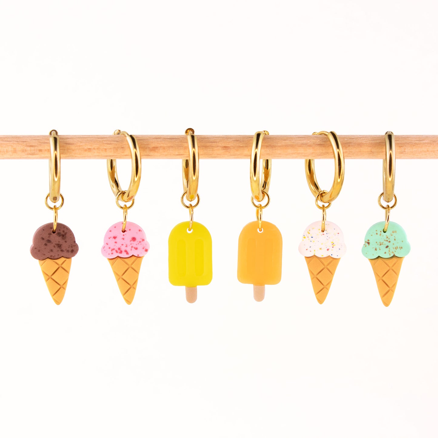 gold charm hoop earrings with ice cream charms cones and popsicles summer earrings