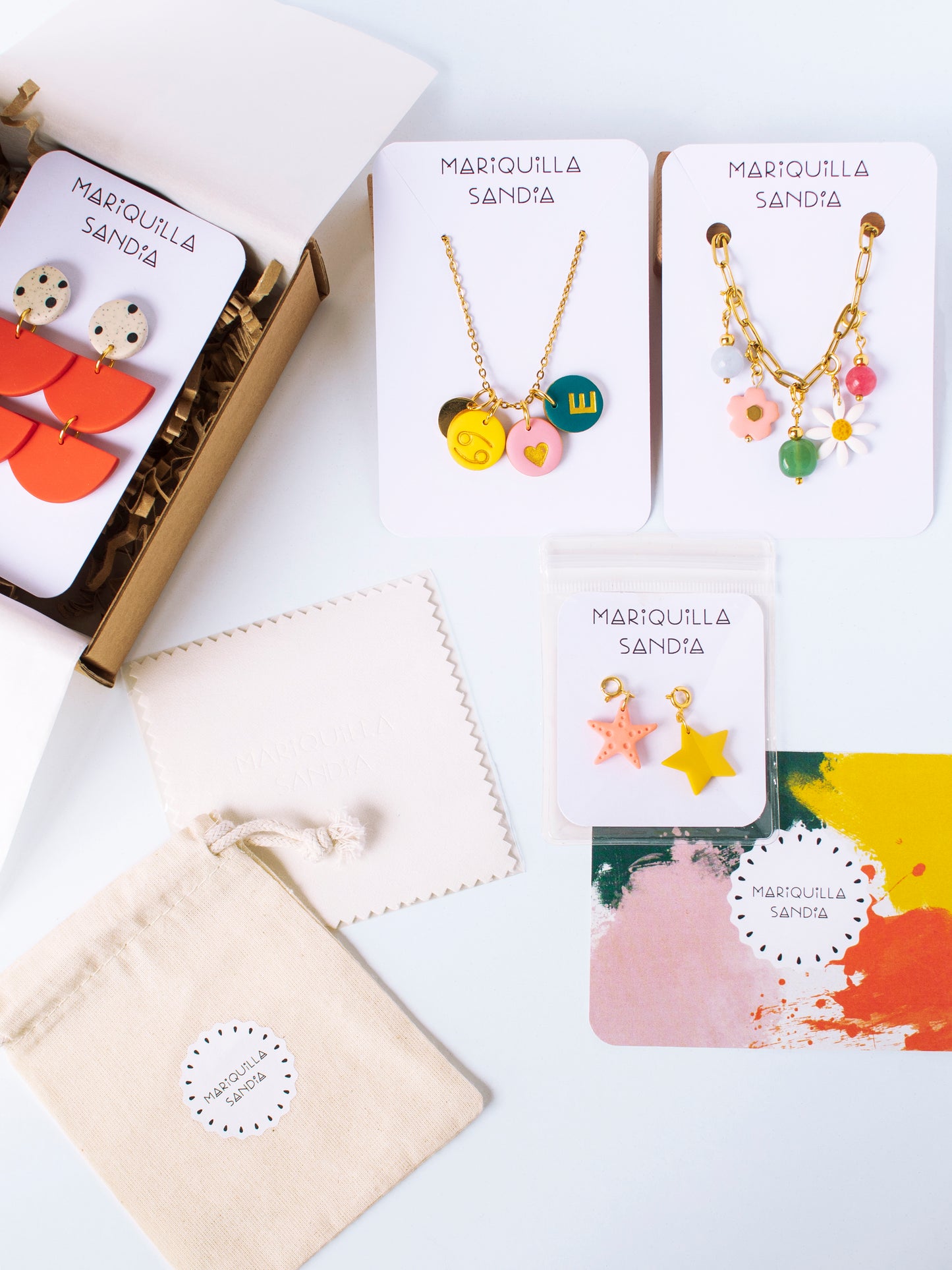 Mariquilla Sandia packaging with earrings and necklace displayed.