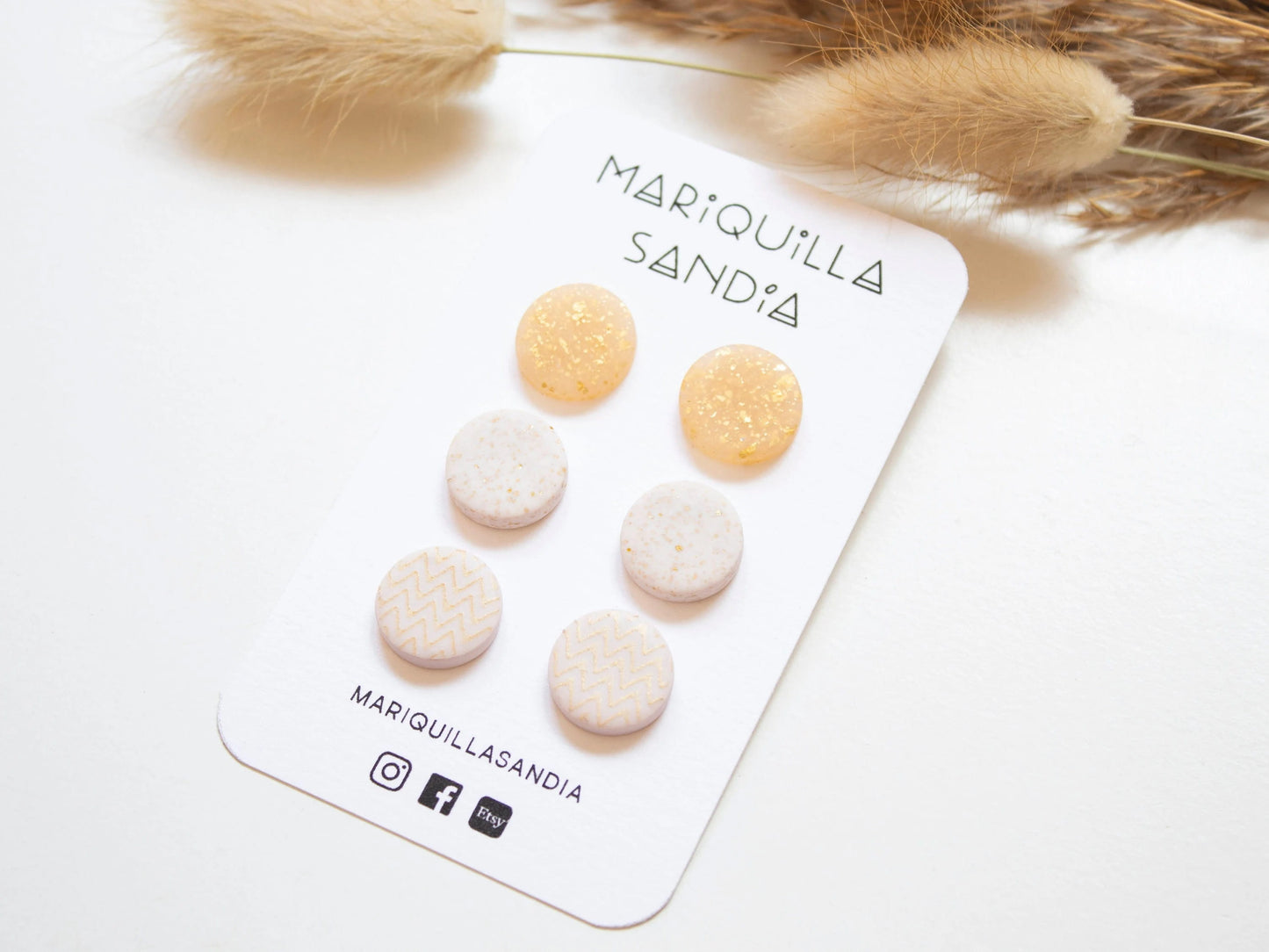 Elegant handmade stud earrings in a neutral color palette