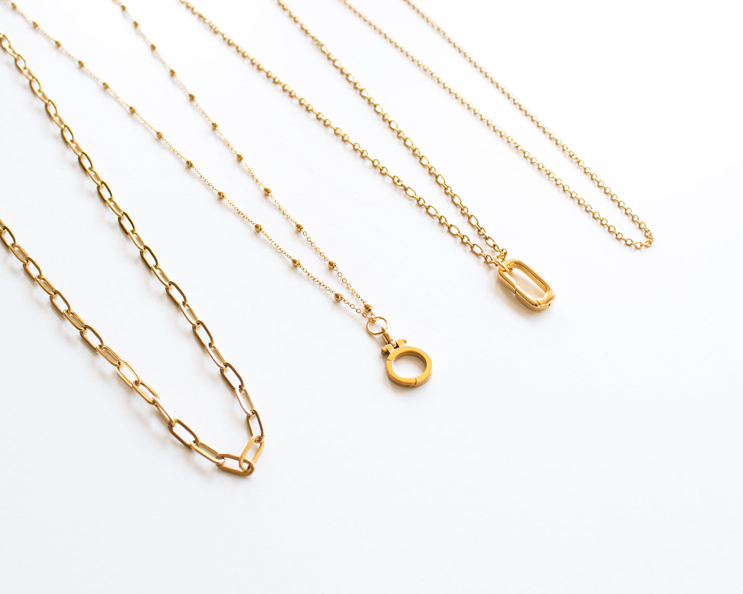 Necklace for charms cover photo showing four gold chain styles Paperclip Satellite Rolo and Dual Link 18k gold plated stainless steel dainty layering chains chain only optional charm holder available