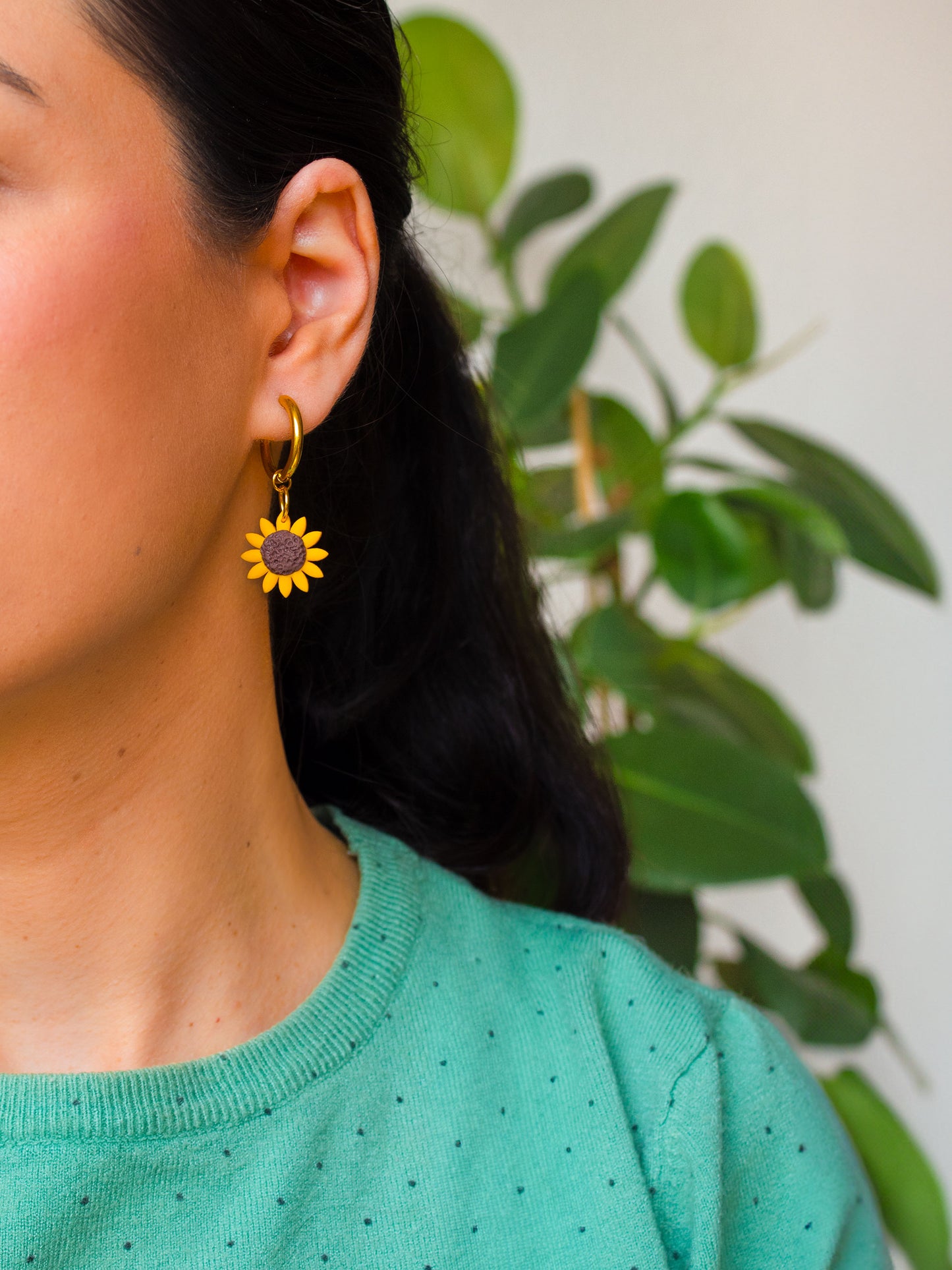 Handmade sunflower hoop earrings with hypoallergenic gold-plated hoops.
