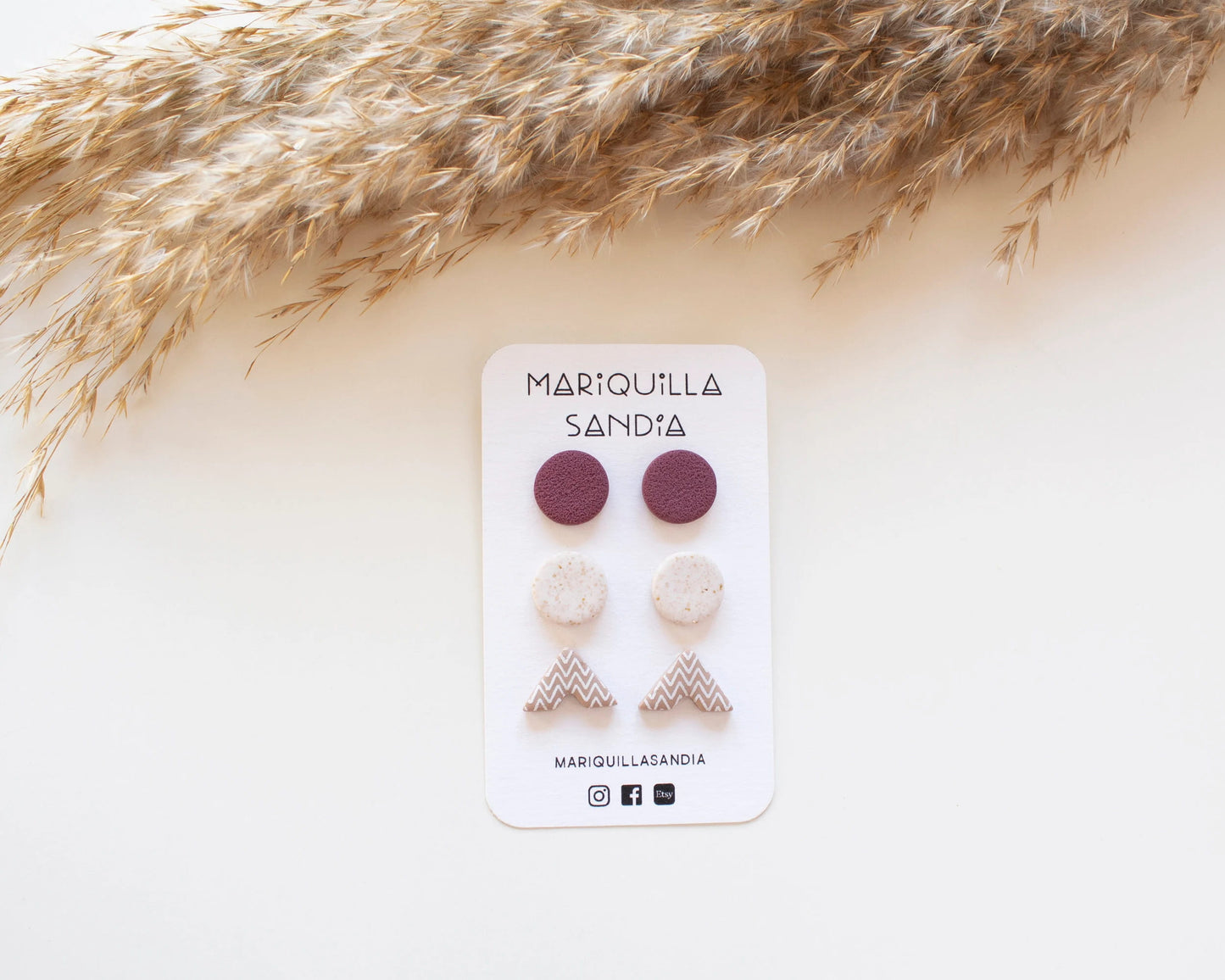 Minimalist stud earrings in neutral and earthy tones