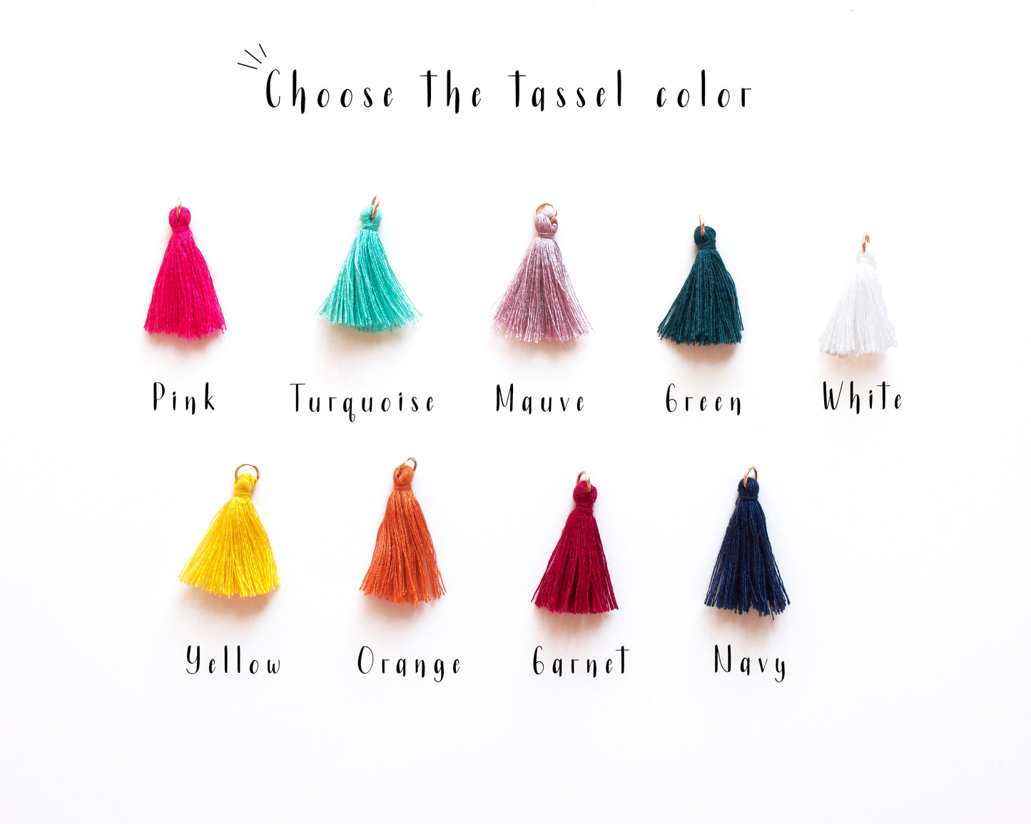 Choose your favorite tassel color for these handmade boho clay earrings.