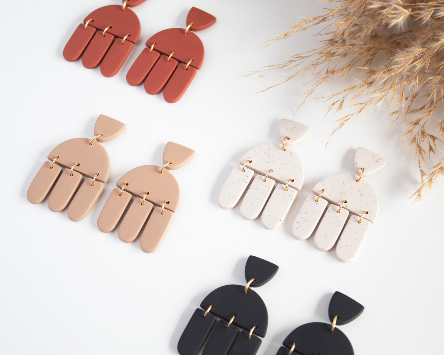 geometric clay earrings, handmade and lightweight, perfect for boho style and hypoallergenic wear