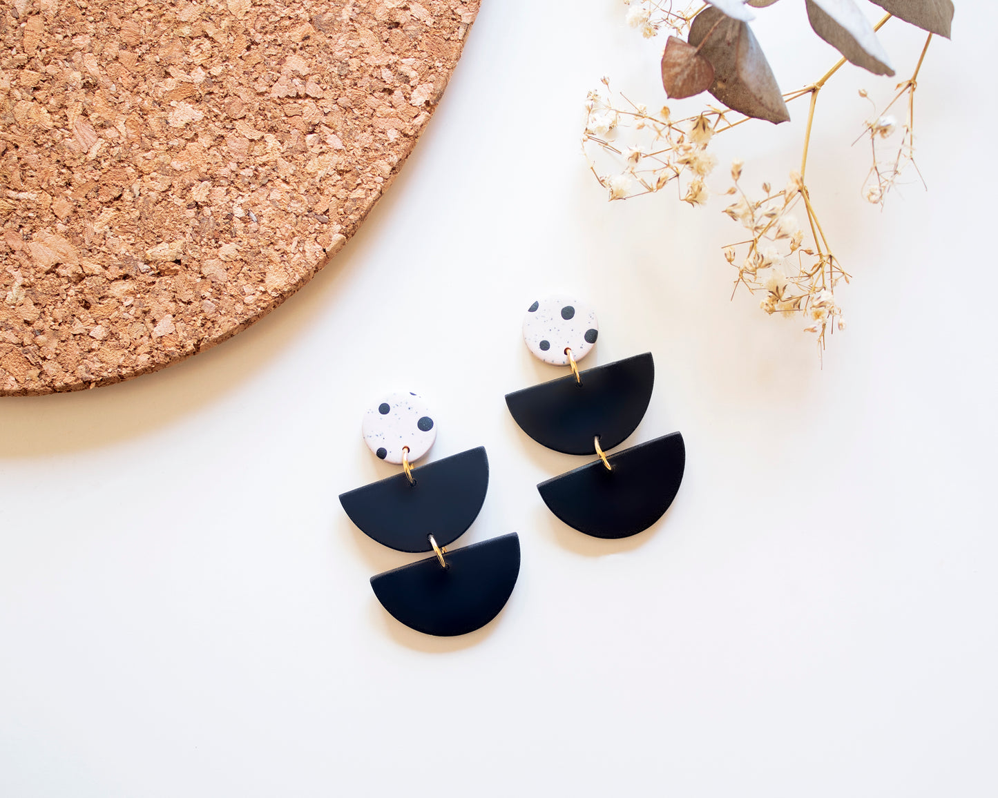 Black and white dangle earrings in boho style, handmade jewelry.