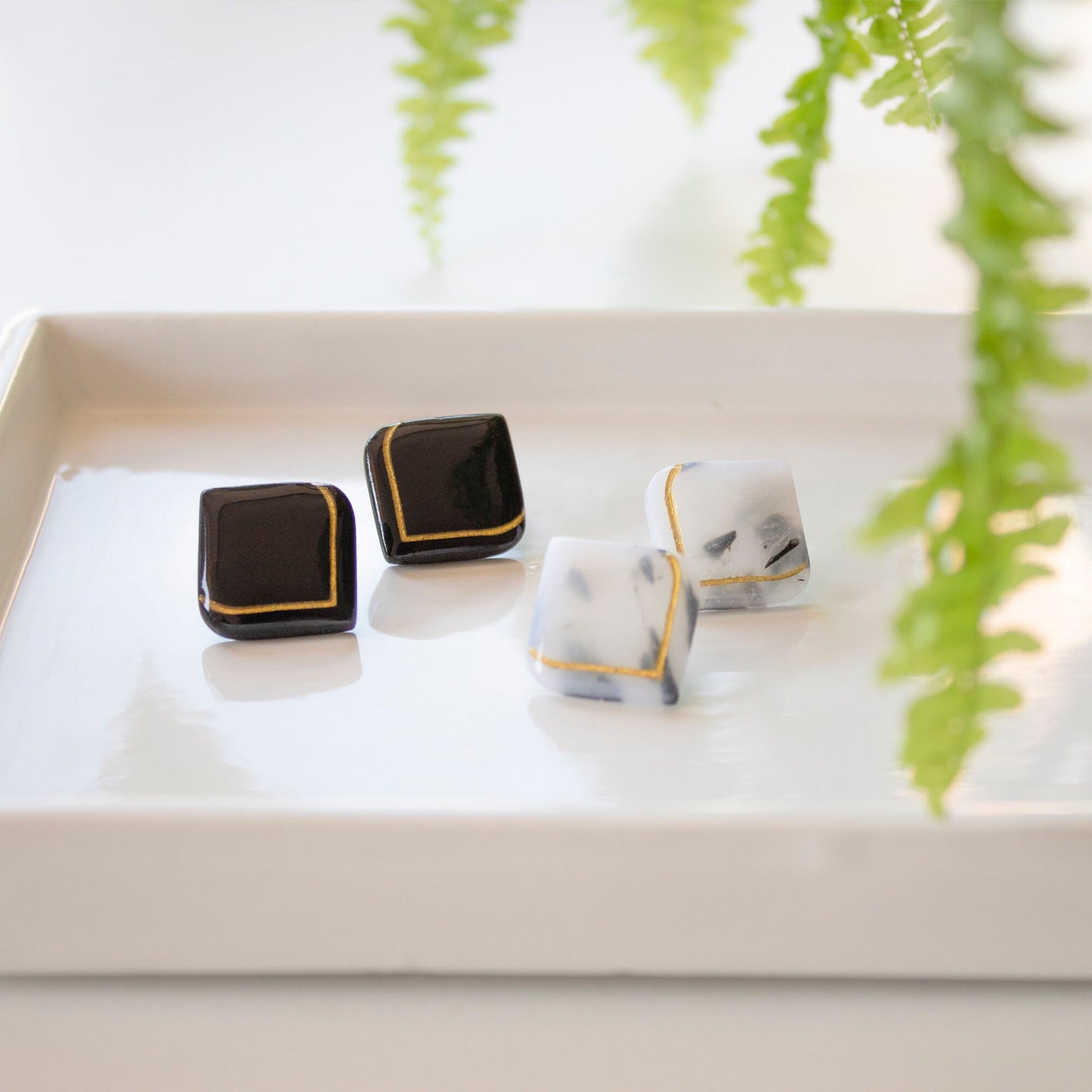 Black and white handmade clay stud earrings Art Deco style statement jewelry