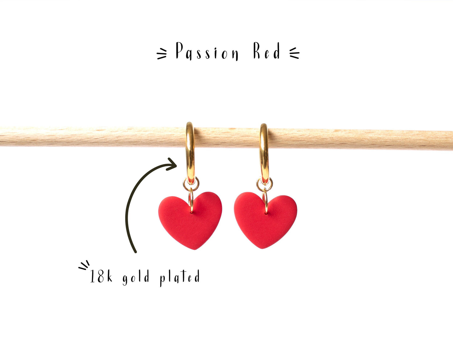Red heart charm hoop earrings with 18K gold plated hoops, perfect for gifting.