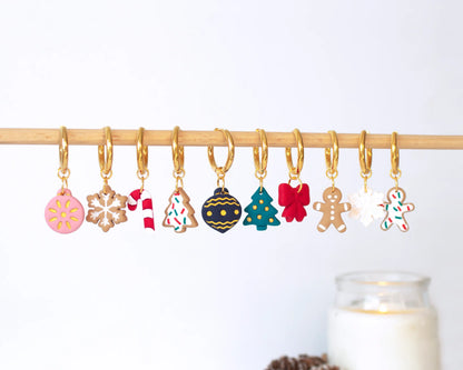 Full set of Christmas-themed handmade polymer clay charms, Gingerbread men, snowflakes, Christmas trees, and candy canes for festive hoop earrings.