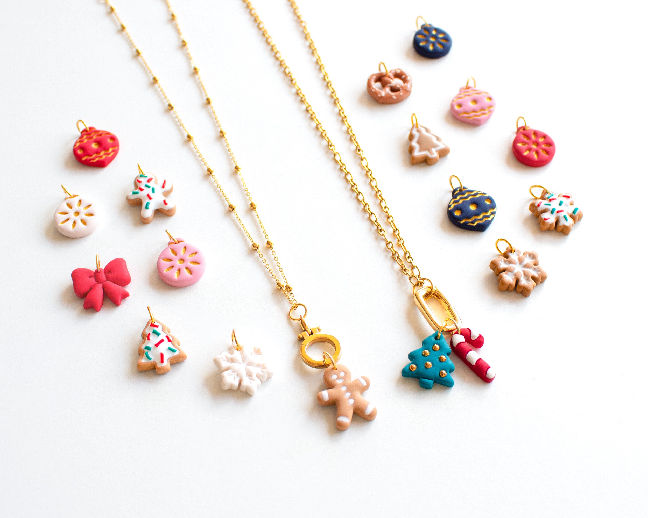 Personalized Christmas charm necklace with gold carabiner holder and handmade clay charms gingerbread candy cane snowflake