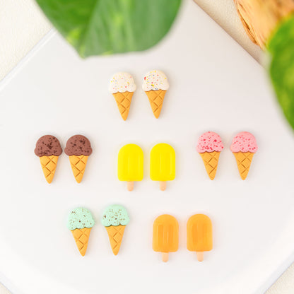 clay stud earrings shaped like colorful ice cream cones and popsicles