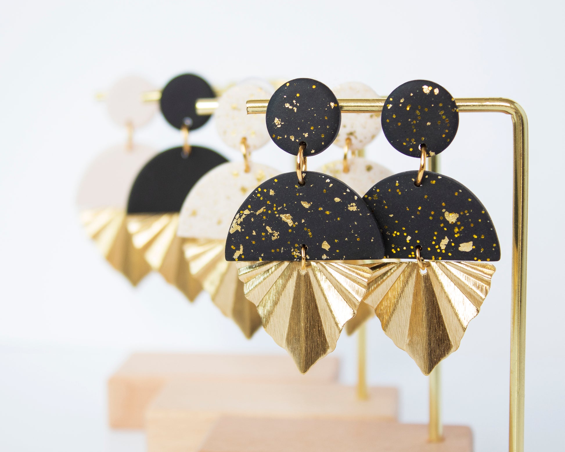 Black and White Long Earrings with Gold Leaf Charm and Golden Accents