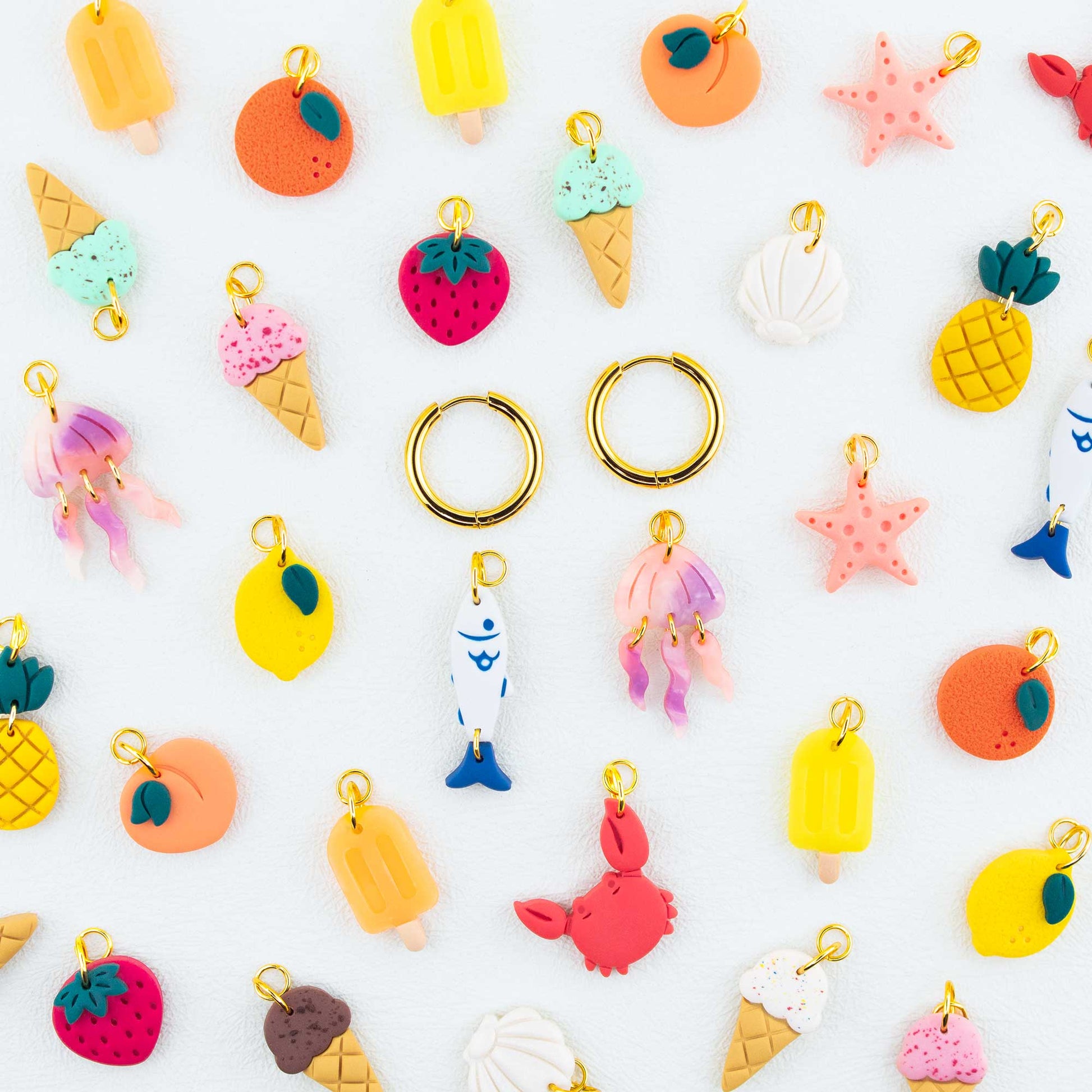 interchangeable summer hoop earrings with handmade clay charms beach, fruit and ice cream
