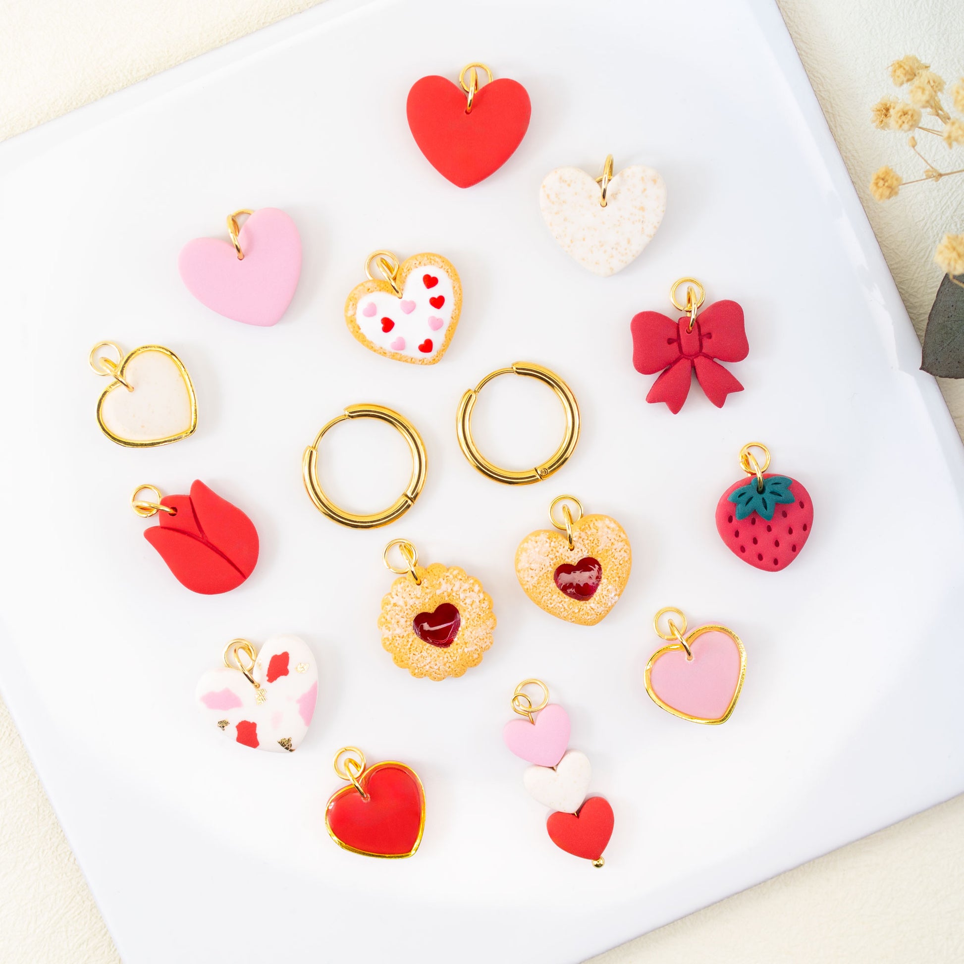Valentine charm hoop earrings with interchangeable cookie heart strawberry and bow charms