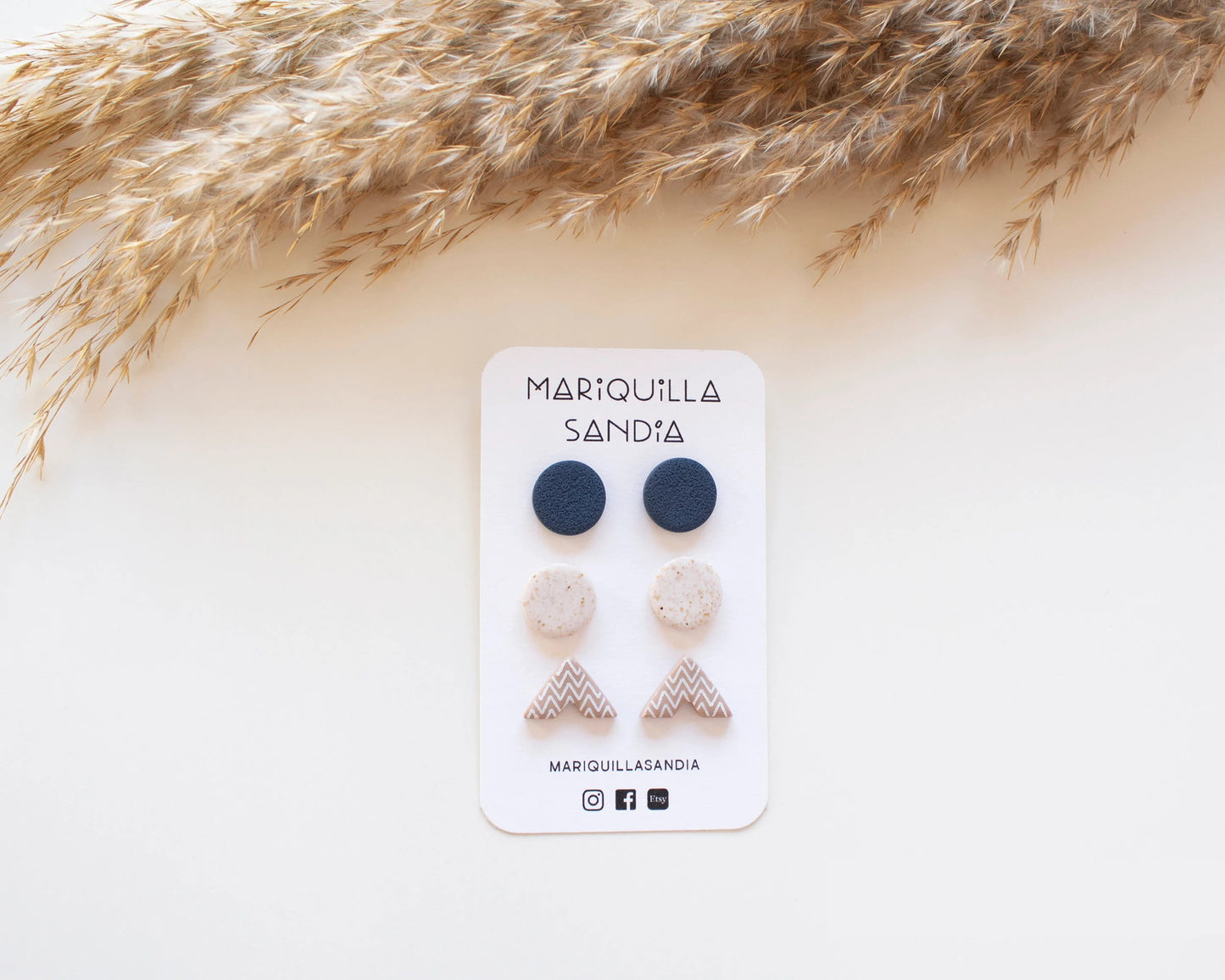 Minimalist stud earrings in neutral and earthy tones