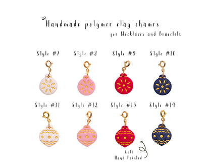 Handmade Christmas ornament charms for necklaces, round and teardrop clay baubles in white, pink, red and navy with gold hand painted details
