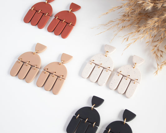 geometric clay earrings, handmade and lightweight, perfect for boho style and hypoallergenic wear