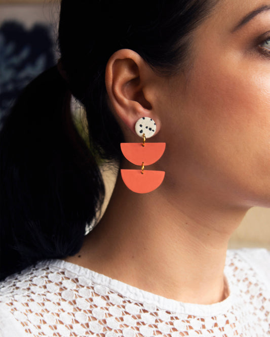 Coral color dangle earrings with boho style, handmade with hypoallergenic materials.