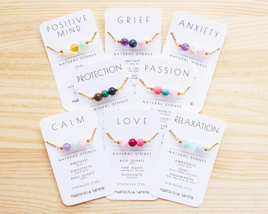 Emotional healing crystal bracelets with intention tags like calm love grief