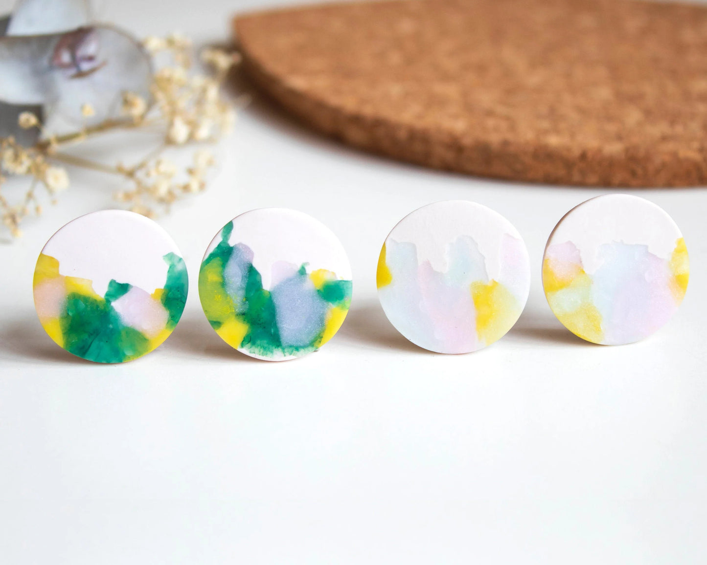Watercolor large stud earrings with abstract color design in green or pink. Handmade hypoallergenic earrings with a lightweight and comfortable feel.